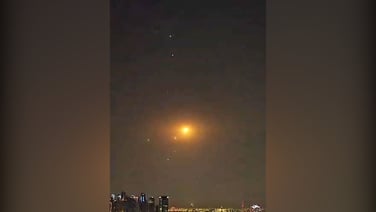 Irish residents of Doha watch as missiles are intercepted