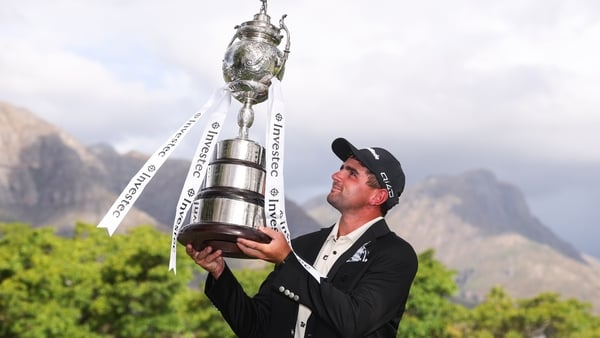 Casey Jarvis of South Africa poses for a photo with the trophy following victory on day four of the Investec South African Open Championship 2026 at Stellenbosch Golf Club on March 01, 2026 in Stellenbosch, South Africa.