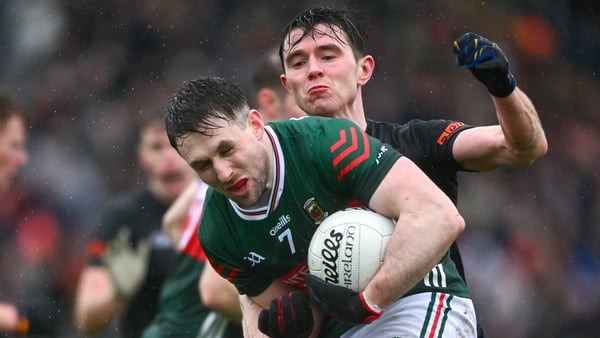 Paddy Durcan of Mayo is tackled by Ben Crealey of Armagh during the Allianz Football League Division 1 match between Mayo and Armagh at Hastings Insurance MacHale Park in Castlebar, Mayo.