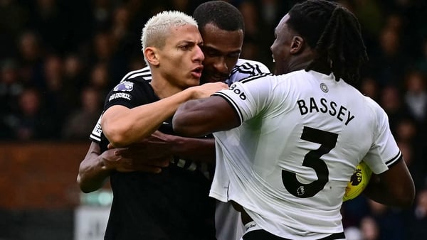 Fulham's French defender #31 Issa Diop (C) mediates between Tottenham Hotspur's Brazilian striker #09 Richarlison (L) and Fulham's Italian-born Nigerian defender #03 Calvin Bassey (R) during the English Premier League football match between Fulham and Tot