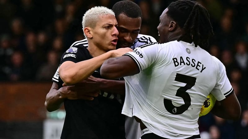 Fulham's French defender #31 Issa Diop (C) mediates between Tottenham Hotspur's Brazilian striker #09 Richarlison (L) and Fulham's Italian-born Nigerian defender #03 Calvin Bassey (R) during the English Premier League football match between Fulham and Tot
