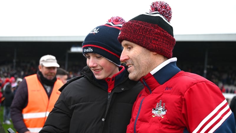 1 March 2026; Cork manager Ben O'Connor poses for a 'selfie' with a young supporter after the Allianz Hurling League Division 1A match between Kilkenny and Cork at UPMC Nowlan Park in Kilkenny. Photo by Ray McManus/Sportsfile