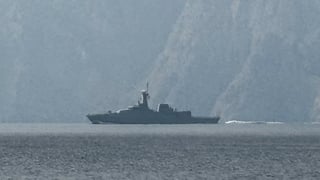 A navy vessel is seen sailing in the Strait of Hormuz