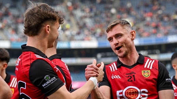 13 July 2024; Down players Caolan Mooney, 21, and Eamonn Brown celebrate after their side's victory in the Tailteann Cup Final match between Down and Laois at Croke Park in Dublin. Photo by Piaras Ó Mídheach/Sportsfile
