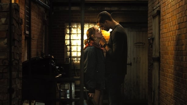 Maika Monroe as Kenna and Tyriq Withers as Ledger share a moment in Reminders of Him