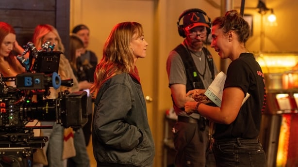 (L-R) Maika Monroe and director Vanessa Caswill on the set of Reminders of Him