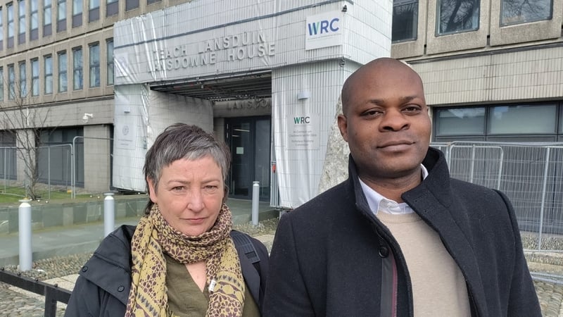 A man and a woman pose outside the WRC