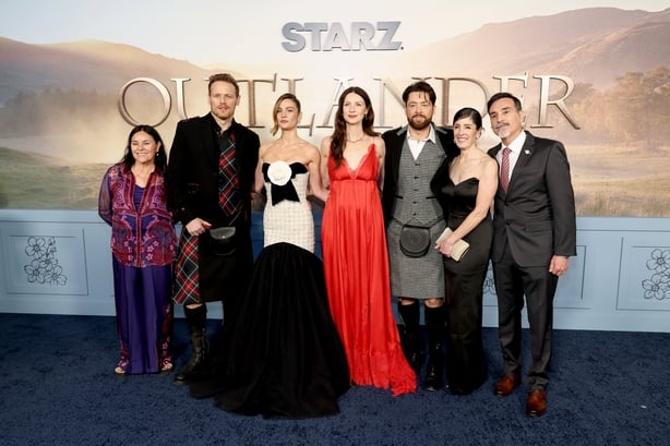 NEW YORK, NEW YORK - MARCH 02: Diana Gabaldon, Sam Heughan, Sophie Skelton, Caitríona Balfe, Richard Rankin, Maril Davis and Matthew B. Roberts attend the Starz "Outlander" season 8 premiere at Alice Tully Hall on March 02, 2026 in New York City. (Photo by Cindy Ord/Getty Images)