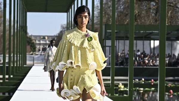 A model presents a creation for Christian Dior for the Women's Ready to Wear Fall/Winter 2026-2027 collection fashion show as part of the Paris Women Fashion Week, in Paris, on March 3, 2026. (Photo by JULIEN DE ROSA / AFP)