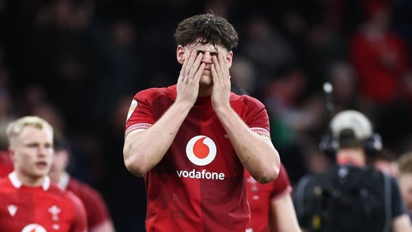 CARDIFF, WALES - FEBRUARY 21: Eddie James of Wales looks dejected after George Turner of Scotland (obscured) scores his team's fourth try during the Guinness Six Nations 2026 match between Wales and Scotland at Principality Stadium on February 21, 2026 in