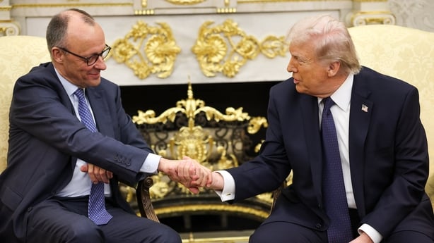 German Chancellor Friedrich Merz and U.S. President Donald Trump shake hands