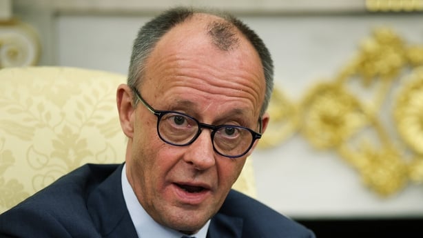 German Chancellor Friedrich Merz speaks during a bilateral meeting with U.S. President Donald Trump in the Oval Office of the White House