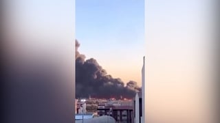 Column of smoke towers over Tehran after reported airstrikes