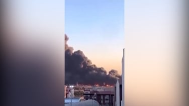 Column of smoke towers over Tehran after reported airstrikes