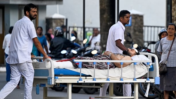 An injured Iranian sailor receives treatment at the Karapitiya hospital in Galle on March 4, 2026 after his frigate, IRIS Dena sank off Sri Lanka's coast. Sri Lanka rescued 32 "critically wounded" sailors aboard the Iranian warship which sank on March 4 following what crew members reported as an exp