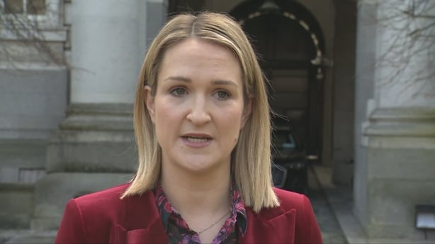 Helen McEntee speaking outside Government buildings