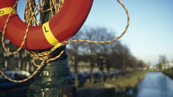 A lifebouy wrapped around a pole at Grand Canal Dublin