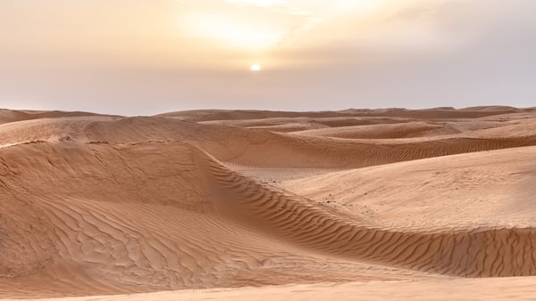 Sunset is seen over dunes of Eastern Sahara desert