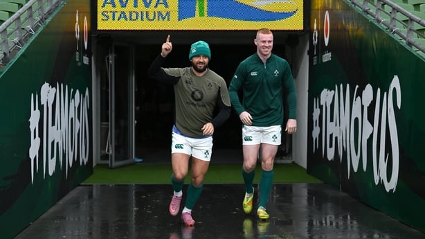 5 March 2026; Jamison Gibson-Park, left, and Nathan Doak make their way onto the pitch for the Ireland Rugby squad captain's run at the Aviva Stadium in Dublin. Photo by Brendan Moran/Sportsfile