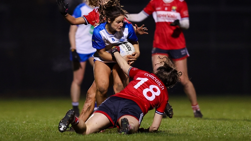 28 February 2026; Áine O'Neill of Waterford is tackled by Aine O'Sullivan of Cork during the Lidl Ladies National Football League Division 1 Round 7 match between Cork and Waterford at Páirc Uí Rinn in Cork. Photo by Michael P Ryan/Sportsfile
