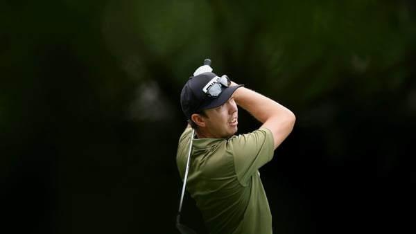 Luke Brown of South Africa plays his second shot on the 15th hole on day one of the Joburg Open 2026 at Houghton GC on March 05, 2026 in Johannesburg, South Africa.