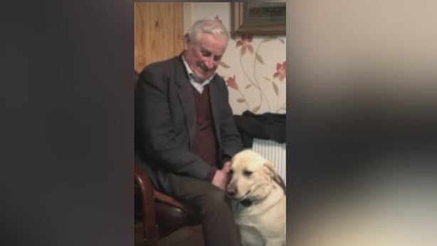 Liam Farrell with his dog at his feet