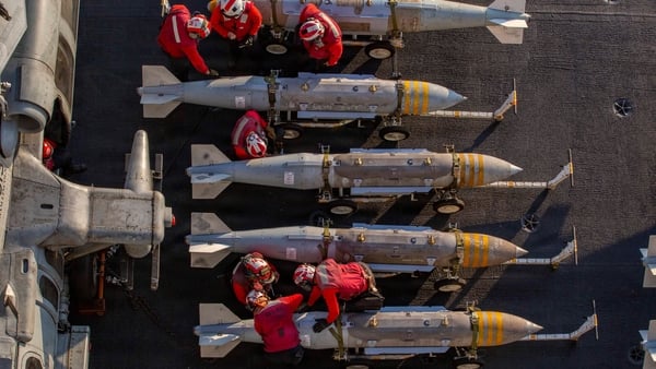 AT SEA, UNSPECIFIED - FEBRUARY 28: (EDITOR'S NOTE: This Handout image was provided by a third-party organization and may not adhere to Getty Images' editorial policy.) In this U.S. Navy released handout, U.S. Sailors prepare to stage ordnance on the fligh