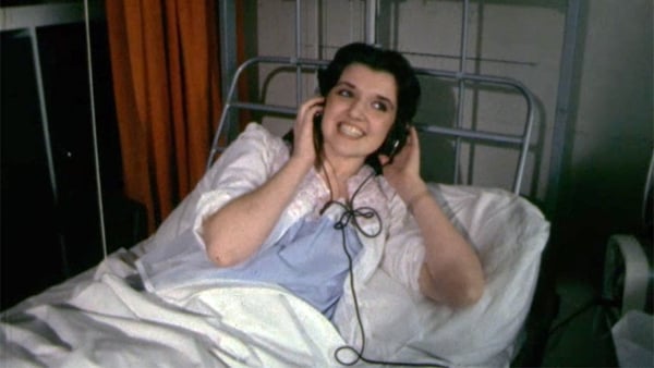 A patient listening to hospital radio in the Ulster Hospital in Dundonald, County Down, 1976.