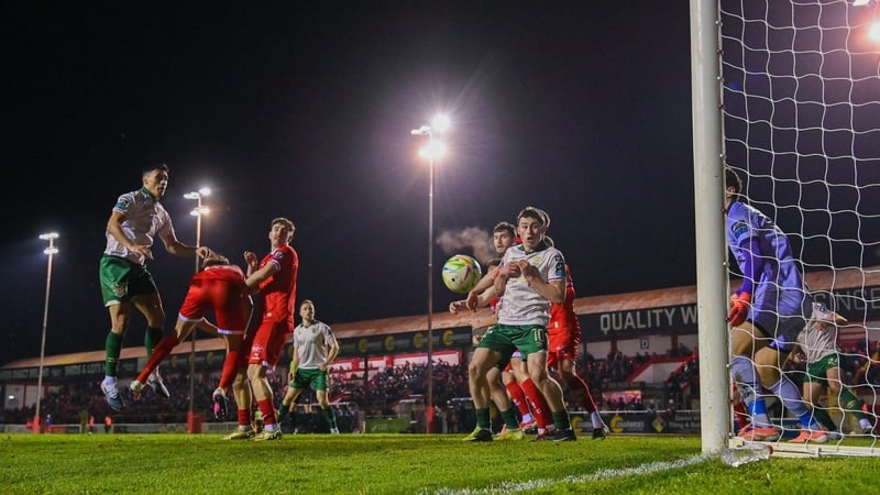 Max Mata of St Patrick's Athletic, left, scores his side's third goal despite the efforts of Evan Caffrey of Shelbourne during the SSE Airtricity Men's Premier Division match between Shelbourne and St Patrick's Athletic at Tolka Park in Dublin. Photo by S