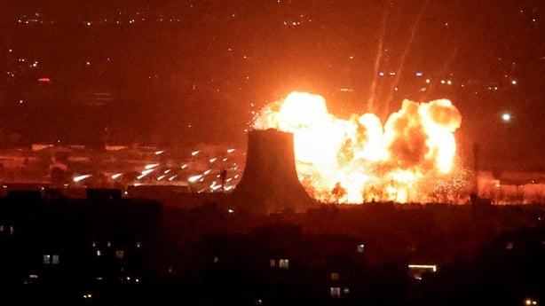 An explosion erupts following strikes near Azadi Tower close to Mehrabad International Airport in Tehran on March 7, 2026