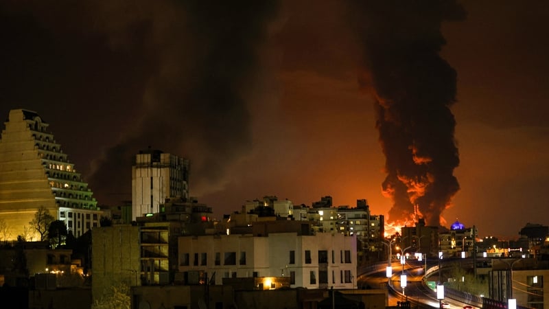 TEHRAN, IRAN - MARCH 07: A large plume of smoke rises over Tehran after explosions were reported in the city during the night on March 07, 2026 in Tehran, Iran. (Photo by Contributor/Getty Images)