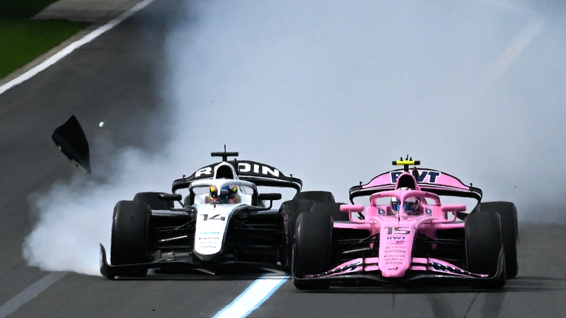 Rodin Motorsport's Norwegian driver Martinius Stenshorne (L) and his teammate, Irish driver Alexander Dunne, crash during the Australia Formula Two Feature Race at Melbourne's Albert Park Circuit on March 8, 2026, ahead of the Formula One Australian Grand