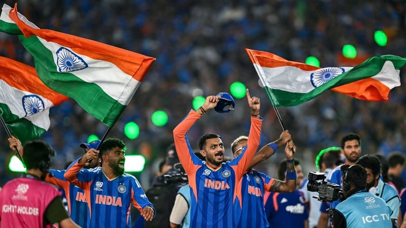India's players celebrate after winning the 2026 ICC Men's T20 Cricket World Cup final match against New Zealand at the Narendra Modi Stadium in Ahmedabad on March 8, 2026. (Photo by Punit PARANJPE / AFP)