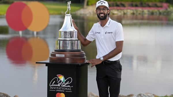 Akshay Bhatia of United States of America holds the trophy after winning in a playoff at the 18th hole during the final round of the Arnold Palmer Invitational presented by Mastercard 2026 at Arnold Palmer Bay Hill Golf Course on March 08, 2026 in Orlando