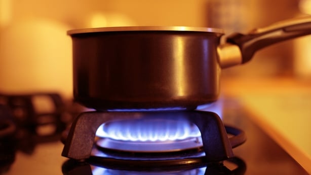 gas cooker in kitchen with pan on it