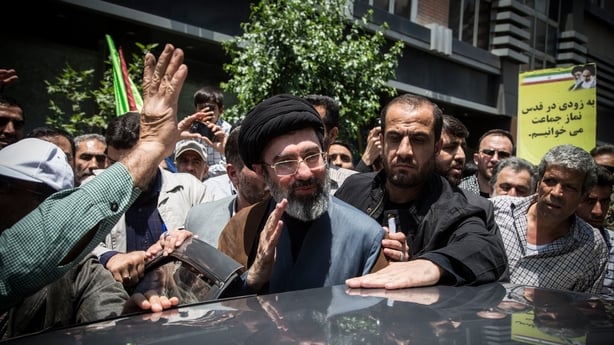 Mojtaba Khamenei (C), the son of the Iranian Supreme Leader Ayatollah Ali Khamenei, participates in the annual Quds Day rally in Tehran, Iran, on May 31, 2019. (Photo by Rouzbeh Fouladi / Middle East Images via AFP)