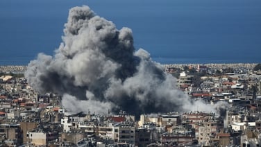 Loud explosions and plumes of smoke in Beirut suburbs after Israeli strikes