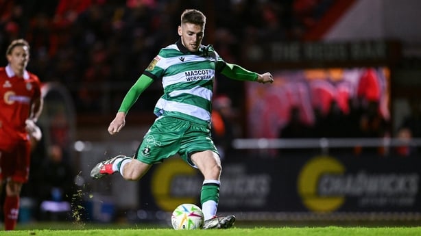 9 March 2026; Dylan Watts of Shamrock Rovers shoots to score his side's second goal, a penalty, during the SSE Airtricity Men's Premier Division match between Shelbourne and Shamrock Rovers at Tolka Park in Dublin. Photo by Ramsey Cardy/Sportsfile