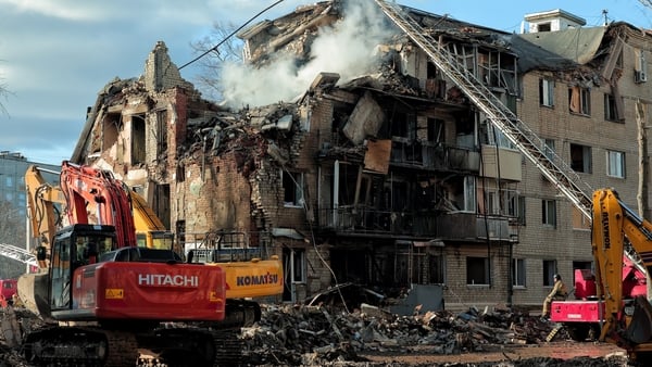 KHARKIV, UKRAINE - MARCH 7: Firefighters extinguish a fire in a damaged apartment building after a Russian ballistic missile attack on March 7, 2026 in Kharkiv, Ukraine. Russian forces attacked the city with ballistic missiles, destroying a multi-story re