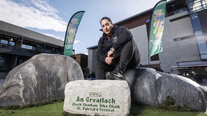 yshea Ullah, Ireland’s former five time Strongest Woman and Stones & Stories performer, is pictured at Dundrum Town as part of the St. Patrick’s Festival 2026 programme. Rooted in Irish rural heritage, stone lifting was historically a test of strength and