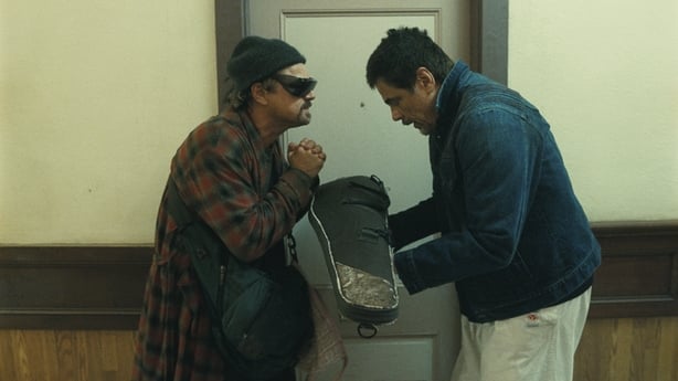 Leonardo DiCaprio as Bob Ferguson and Benicio del Toro as Sergio St Carlos say their goodbyes in One Battler After Another