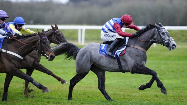 NEWBURY, ENGLAND - DECEMBER 29: Harry Cobden riding No Drama This End (marron/blue) clear the last to win The Coral Challow Novices' Hurdle at Newbury Racecourse on December 29, 2025 in Newbury, England. (Photo by Alan Crowhurst/Getty Images)