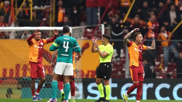Noa Lang of Galatasaray A.S. reacts, as Virgil van Dijk of Liverpool interacts with referee Jesus Gil Manzano during the UEFA Champions League 2025/26 Round of 16 First Leg match between Galatasaray SK and Liverpool FC at Ali Sami Yen Spor Kompleksi on Ma