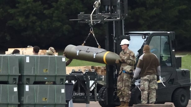 Members of the US Air Force (USAF) prepare munitions at RAF Fairford in south-west England