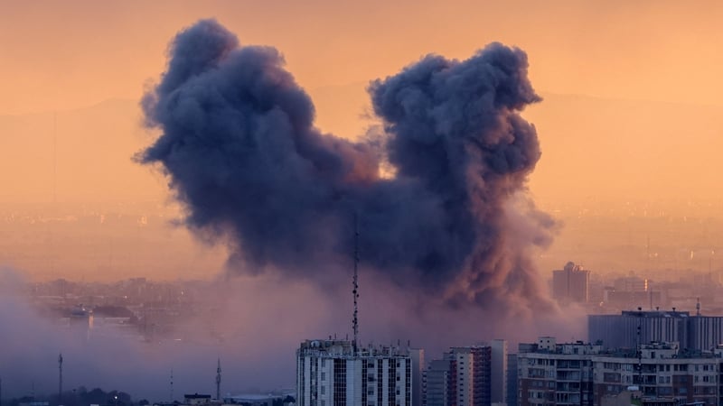 TOPSHOT - A plume of smoke rises after a strike on the Iranian capital Tehran, on March 3, 2026. Iran stepped up its attacks on economic targets and US missions across the Middle East on Tuesday as the US president warned it was "too late" for the Islamic