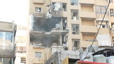 Apartment block in Beirut damaged by Israeli strike