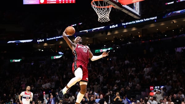 Bam Adebayo #13 of the Miami Heat dunks the ball against the Washington Wizards during the third quarter of the game at Kaseya Center on March 10, 2026 in Miami, Florida. NOTE TO USER: User expressly acknowledges and agrees that, by downloading and or usi
