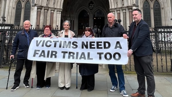 Kenny Donaldson, chair of the South East Fermanagh Foundation (SEFF), with families of Troubles victims