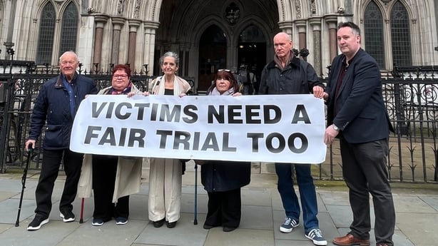 Kenny Donaldson, chair of the South East Fermanagh Foundation (SEFF), with families of Troubles victims