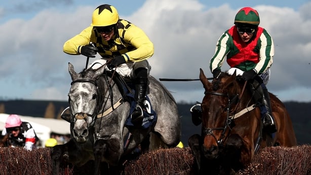 Cheltenham , United Kingdom - 11 March 2026: Kitzbuhel, with Harry Cobden up, left, jump the last alongside Final Demand, with Paul Townend up, who finished second, on their way to winning the Brown Advisory Novices' Chase on day two of the 2026 Cheltenham Racing Festival at Prestbury Park in Chelte
